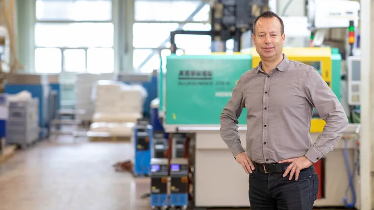 Business owner on the floor of a manufacturing facility